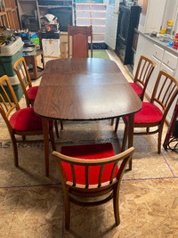 Vintage wooden table and wooden chairs