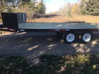 Excellent Condition, 20’ ATV/Sled Trailer. All New tires, and decking. Retractable ramp for loading...