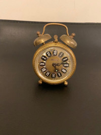 Antique Blessing wind up filigree brass alarm clock. 