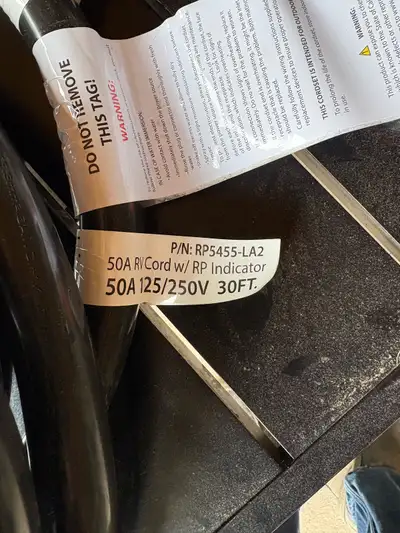 30 foot 50 amp RV power cord. Never used. Came with new trailer.