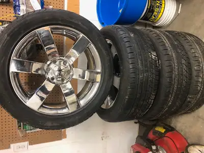 For sale: TrailBlazer SS rims with 255/50/R20 Goodyear Eagle Sport all-season tires. The tires have...