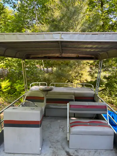 1988 40 horse power stroke. Runs nicely. Needs carb kit, 24 foot pontoon, aluminum canopy