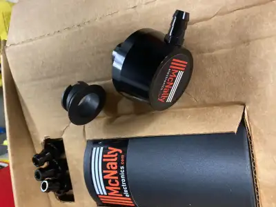 I am selling a NEW McNally Electronics PCV Catch Can designed for Ford F-150 3.5L and 2.7L GTDI engi...