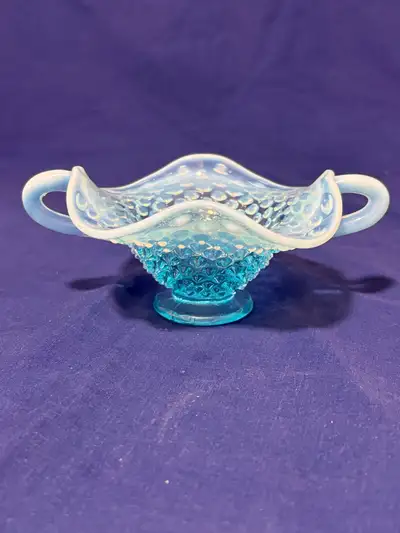 Vintage Fenton blue opalescent hobnail bonbon dish with handles. A beautiful blue opal glass, transi...
