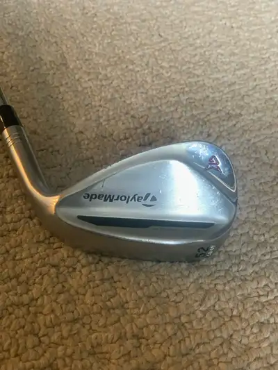 Taylormade Milled Grind 2 raw face 52* wedge. This wedge is in very good to excellent condition.