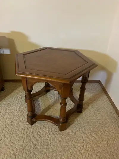 This is a beautiful, used, hexagon-shaped side table, perfect for adding a touch of elegance to any...