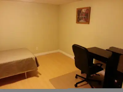 A bright, fully furnished room in the basement apartment of a detached house in a calm residential n...