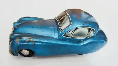 Jaguar tin-toy de marque DISTLER, fait en Allemagne de l'ouest, échelle 1/28, ce modèle a batterie,...