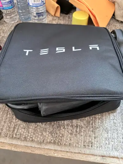 Selling a Tesla Mobile Charger Gen 3 in excellent condition. It's the perfect portable charging solu...