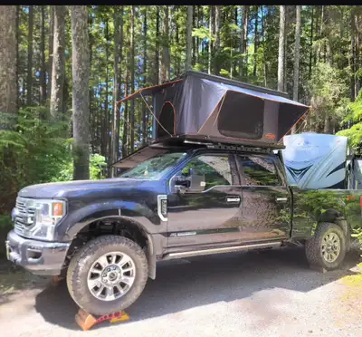 Aluminum shell rooftop tent. Used 4 times (buying a camper so this needs to go). Comes with insulate...