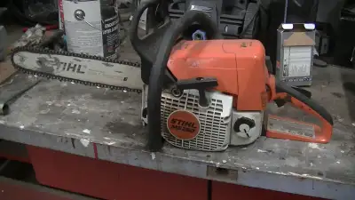 Stihl MS 250 chainsaw with case, View more