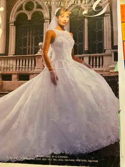 Beautiful wedding dress, size 8. Includes beaded 3/4 length gloves. Drycleaned and professionally bo...