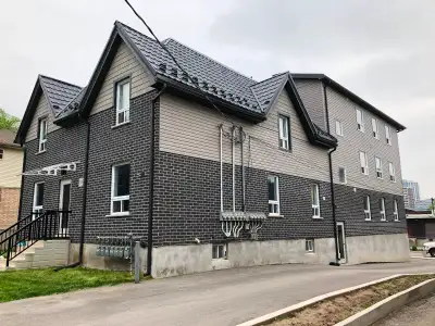 This bright & modern 1-bedroom apartment in Kitchener features an open-concept layout with contempor...