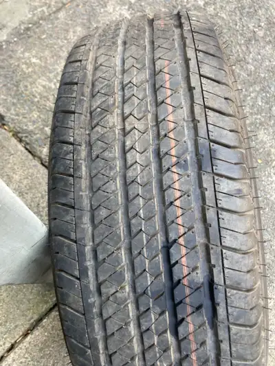 Up for sale I have one Bridgestone dueler H/T tire. The size is P2 55/70 R 17. The tire is brand new...