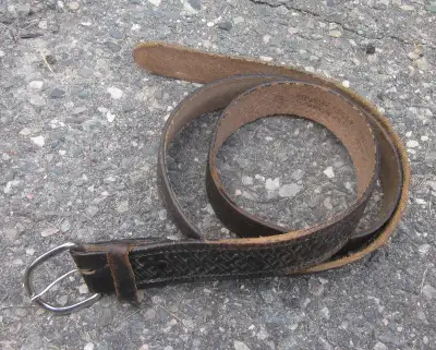 $20 Size 52 leather belt with cross hatch design, vintage American comes with buckle that's on it.