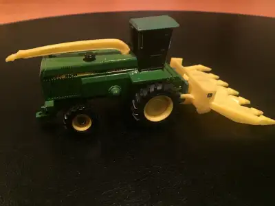 John Deere 6910 die cast metal 3/18 scale Mint condition. $30. Call or text 403-872-7524. Red Deer