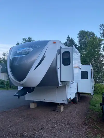 1/2 ton towable Couples trailer with sofa bed in living area. Very spacious inside. No issues and ha...