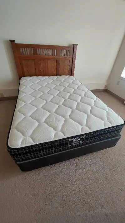 Free like new Kingsdown double bed with solid wood headboard., View more
