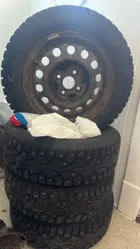 175/65R/14 winter studded tires on steel rims