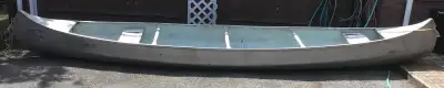 Flat bottom aluminum canoe. Very stable and unsinkable with flotation in bow and stern.