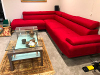 Brand new Red sectional sofa and coffee table.