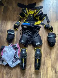 Kids hockey equipment and bag. Used for one season only