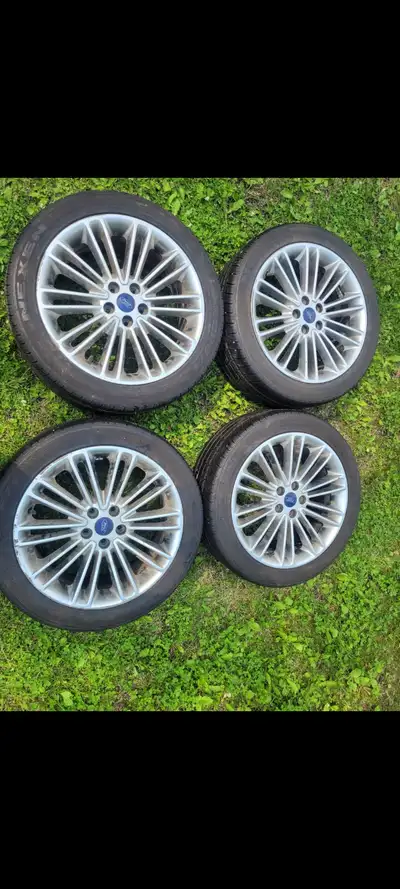 Nexen CP761 . 235/45r18 tires are like new 90% tread left. rims have some scuffs and scratches. rims...
