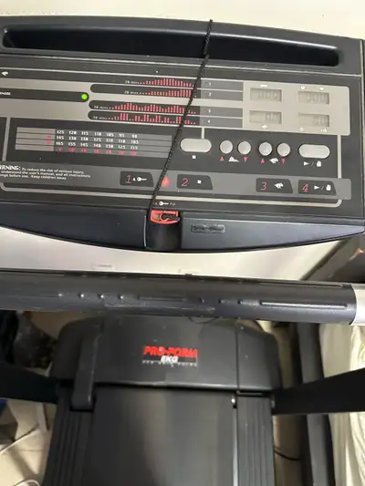 This pre-owned ProForm EKG treadmill is a sturdy and functional fitness machine designed to help you...