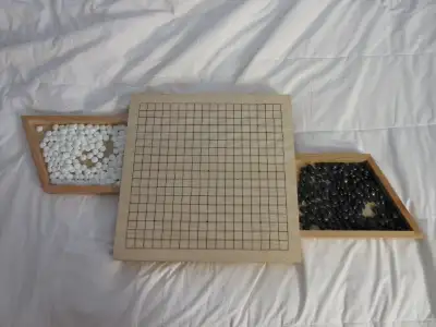 Wooden Go Board Game Set with Drawers, Goban Game Board with Stones Pick up in Timmins. Could be shi...