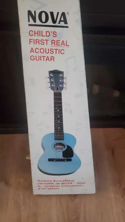 Nova child's first real guitar used, View more