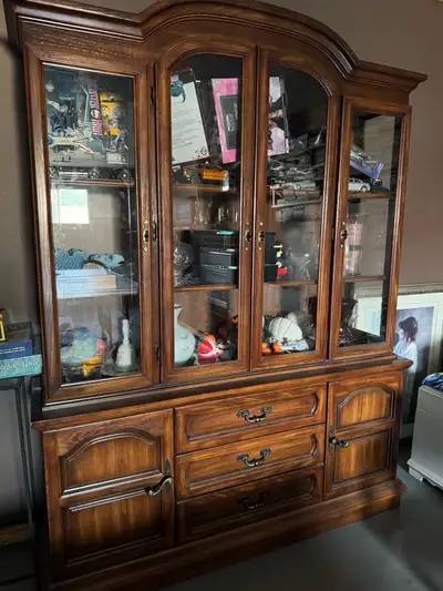Well made heavy wood hutch china cabinet with storage drawers Two pieces to carry separately Asking...