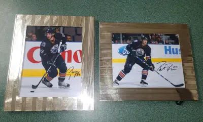 Edmonton oilers Dustin Penner / Sam Gagner autograped framed pitcures. Frames have scratches. Andy D...