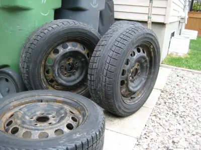 4 YOKOHAMA WINTER TIRES AND RIMS 205/55 R16