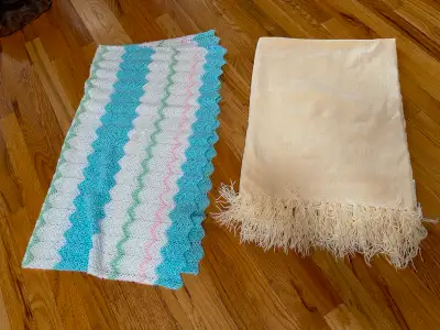 Two baby blankets, Never been used, Blue one is 33 X 38 inches, Cream one is 33 X 45 inches - 100% a...
