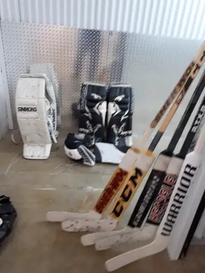 32 inch black and silver pads and right hand gloves and sticks., View more