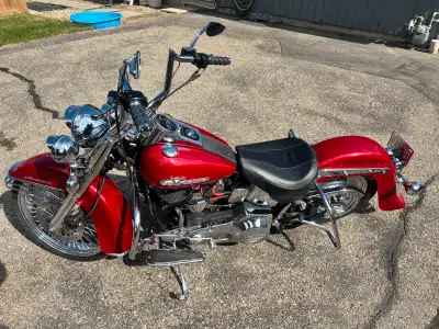 **For Sale: Stunning 1998 Heritage Softail Cholo / Vicla – A True Head-Turner!** Rev up your riding...