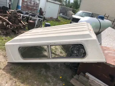 Fibreglass truck canopy in very good shape. All windows are intact, dimensions are approximately 89”...