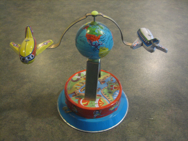 Vintage Collectible Windup Toy Airplanes Around Globe Carousel in Arts & Collectibles in Comox / Courtenay / Cumberland