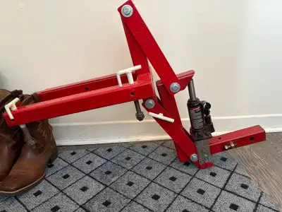 Je vends un motojackrack usagé en rouge vif, conçu pour transporter facilement votre motocross avec...