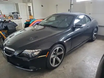 BEEN WAITING TO BUY A CONVERTIBLE BUT THE TIME NEVER RIGHT? THIS GORGEOUS BMW IS FULLY LOADED IT'S A...