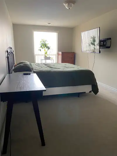 Master bedroom in a 2 bedroom open concept apartment for a single person Furnished , King size bed ,...