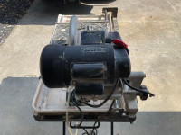 10” Wet Tile Saw with Newer Bosch Saw Blade. Very Good Condition