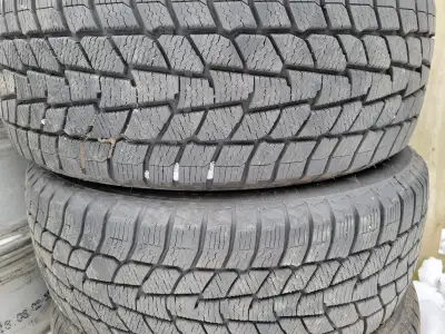 DOT code says the 195/60R15 set of 4 was made in 2021. 2 all-season tires like new, and 2 snow tires...