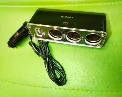 12Volt 3 socket 1 USB cigarette lighter socket splitter adapter GUC Retails for $25+tax ASKING $10