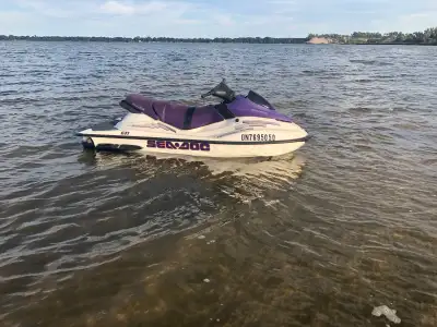 Selling my Sea-Doo GTI 720 from 2003 on trailer, a reliable personal watercraft. Seat is ripped and...