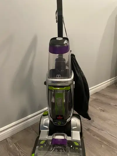 Upright powerful cleaner with upholstery attachment. Nearly new condition.