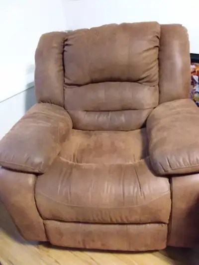 Electric reclining loveseat and chair for sale. Loveseat 250. Chair 100. Like new no rips or stains....