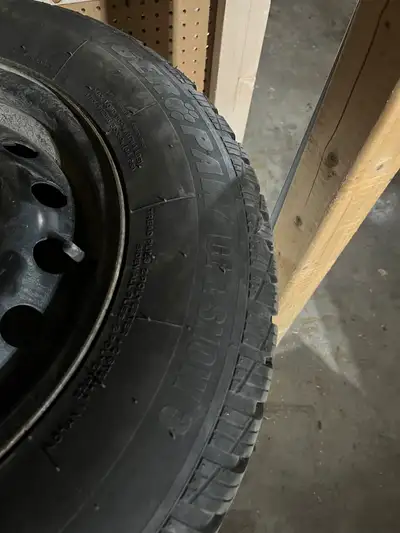 215/70 R16 Uniroyal Tiger & Paw ice & snow on rims. Only used 1 winter, bought new last December. Do...