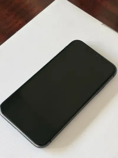 Selling my used black iPhone 11, fully functional with 128 GB of storage, featuring a dual-camera sy...