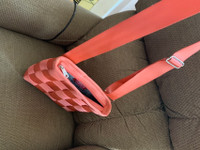 Peachy-orange colored Harvey's seat belt messenger bag/purse